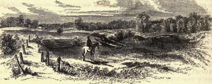 In June 1866, a year after Sherman and the Twentieth Corps had passed through the Spotsylvania, Benson Lossing made a sketch of a fortification-torn landscape there—a drawing soon converted to this woodcut.  Lossing identified the subject as “The Place Where Sedgwick Was Killed,” but the presence of a building in the background, seemingly in the area of the battle-destroyed Spindle House, suggests that some other area of the battlefield was his actual subject.  Source: Lossing, Pictorial History of the Civil War in the United States of America 3: 306.
